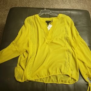 Canary yellow blouse
